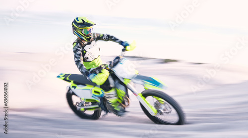 Fototapeta Naklejka Na Ścianę i Meble -  Bike, sand and speed with a sports man riding a vehicle in the desert for adventure or adrenaline. Motorcycle, training and freedom with an athlete outdoor in nature for power or active competition