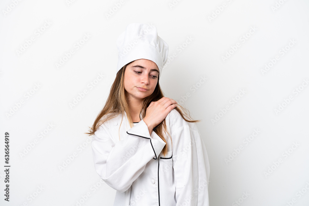 Young caucasian chef woman isolated on white background suffering from pain in shoulder for having made an effort Young caucasian chef woman isolated on white background suffering from pain in shoulder for having made an effort