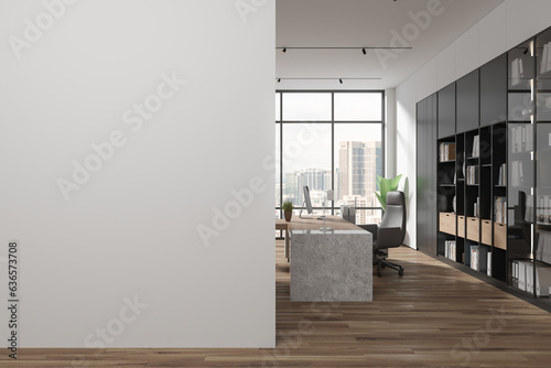 Photography Stylish ceo interior with desk and pc computer, window and mock up wall