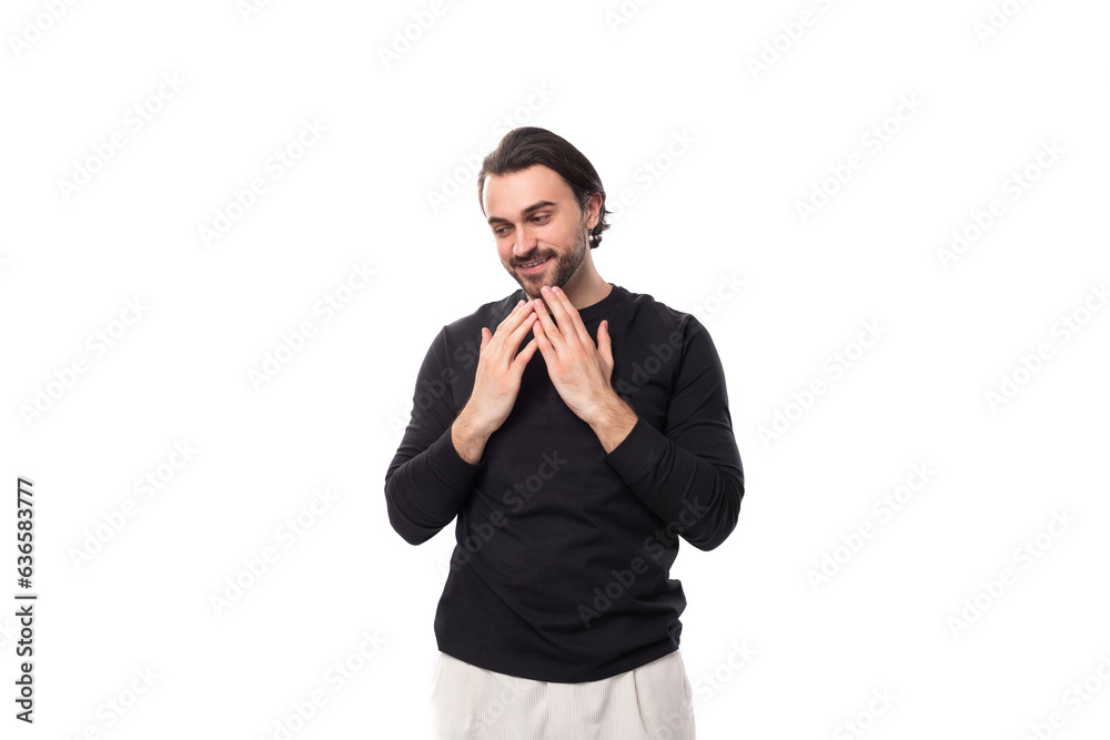 close-up of a young well-groomed brunette man with a haircut and a beard dressed in a black jacket isolated on a white background with copy space close-up of a young well-groomed brunette man with a haircut and a beard dressed in a black jacket isolated on a white background with copy space