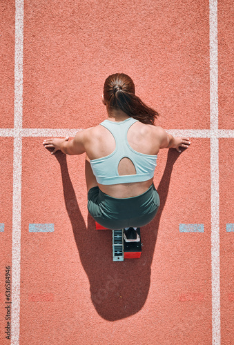 Fototapeta Naklejka Na Ścianę i Meble -  Start, running and fitness with woman on race track from above for sports, competition and marathon. Exercise, health and wellness with runner in stadium for challenge, speed and energy performance