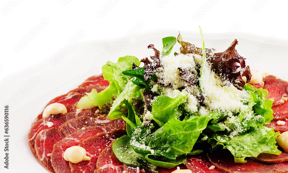 Veal carpaccio with parmesan cheese on white plate Veal carpaccio with parmesan cheese on white plate