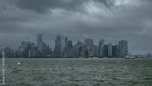 Manhatten skyline on a cloudy  overcast  autumnal day.  The top of the Freedom tower is obscured by low level clouds
