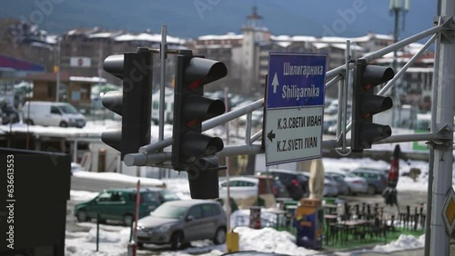 Bansko, Bulgaria - 20 Mar, 2023: Traffic street directions signs in Bansko city centar. Bansko is a winter ski resort in Bulgaria where a number of world cup events are held photo
