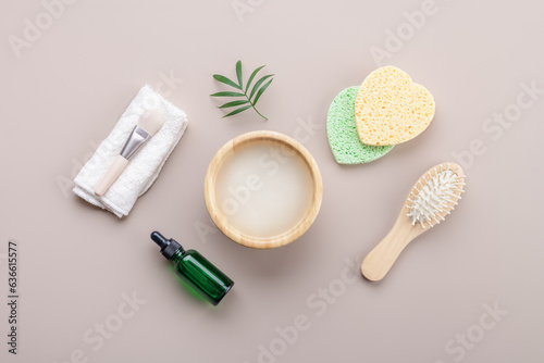 Homemade cosmetic rice water with ingredients on beige background, healthy beauty treatment ingredients for homemade comsetics, beauty recipe for home spa, natural skincare preparation, top view