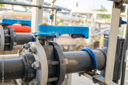 Butterfly manual Valve on the waste water pipe line. The photo is suitable to use for industry background photography, power plant poster and electricity content media.