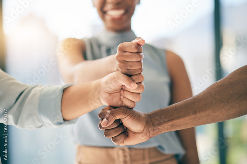 Fist bump stack, support or business people for motivation, teamwork or mission in collaboration. Partnership, hands closeup or employees meeting in huddle with goal, vision or solidarity together