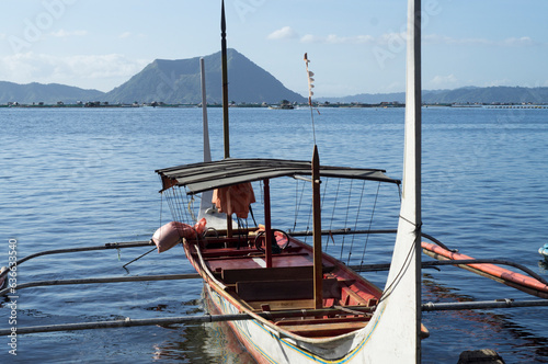 Tourist Boat Parked at Lakeshore that cater to interisland travellers photo