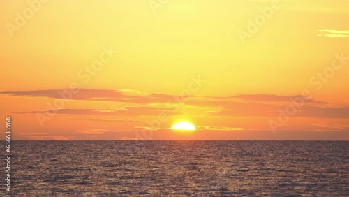 Sunset over sea horizon and clouds, hand held
