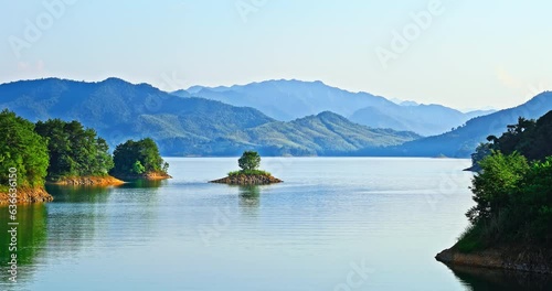 Clear lake and green mountain natural scenery in Thousand Island Lake, Hangzhou, Zhejiang Province, China. photo