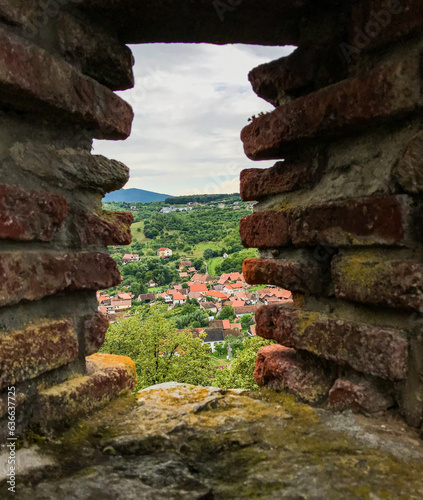 A window in a brick wall at an old fortress