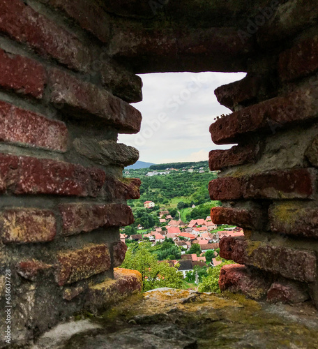 A window in a brick wall at an old fortress
