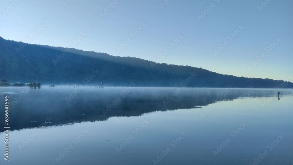Landscape with morning fog in the Beratan lake, Tabanan, Bali. Landscape with morning fog in the Beratan lake, Tabanan, Bali.