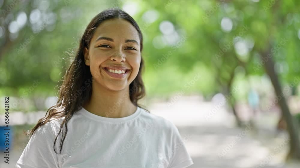 African american woman smiling confident standing at park African american woman smiling confident standing at park