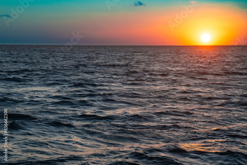 Beautiful nature scene of colorful sunset over ocean