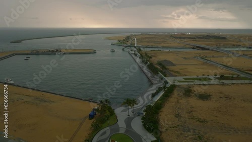Wallpaper Mural Aerial view of almost empty marina, waterfront promenade and futuristic footbridge. Rainy weather above sea in distance. Colombo, Sri Lanka Torontodigital.ca