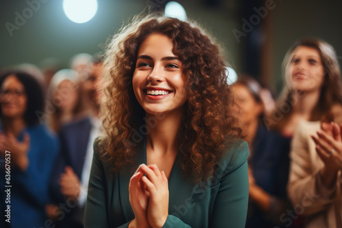 Young woman speaker in business seminar with group of Audience applauding, training and coaching