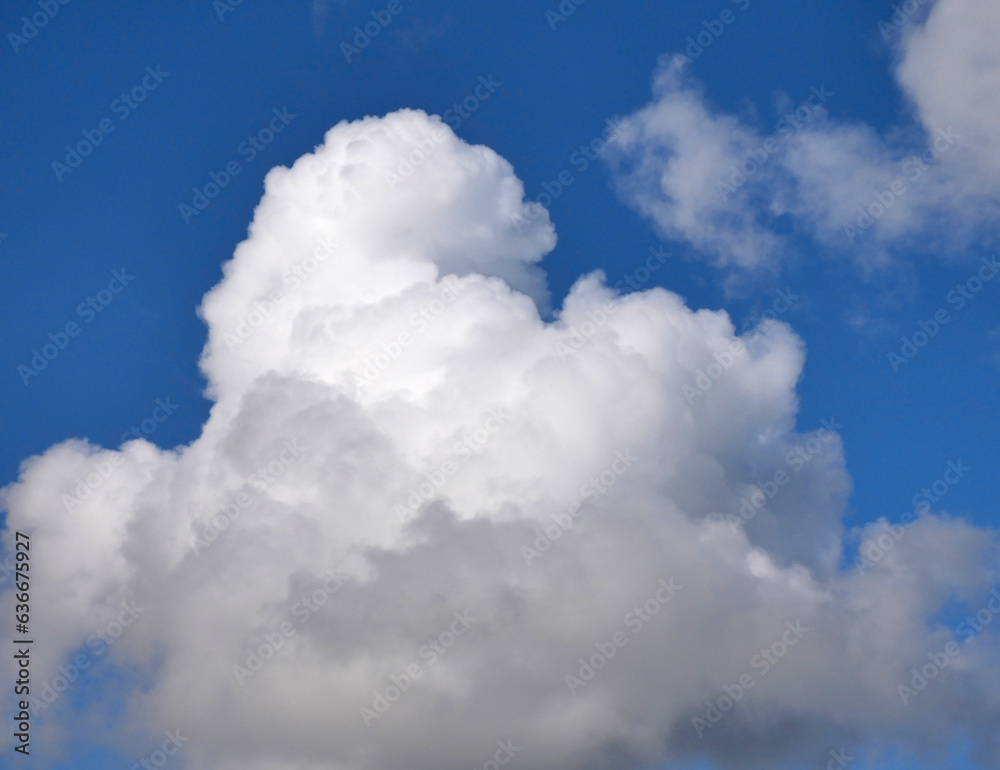 White fluffy cloud over blue sky background, beautiful heaven photo White fluffy cloud over blue sky background, beautiful heaven photo