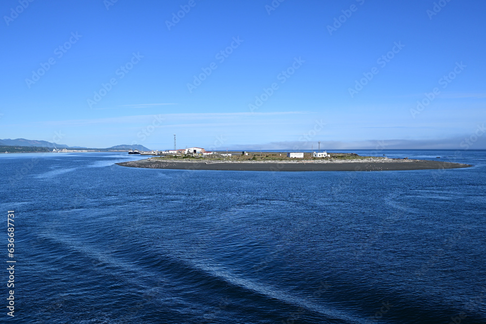 Obraz premium Coast Guard Station on Ediz Hook in Port Angeles Harbor, Washington on clear sunny summer morning.
