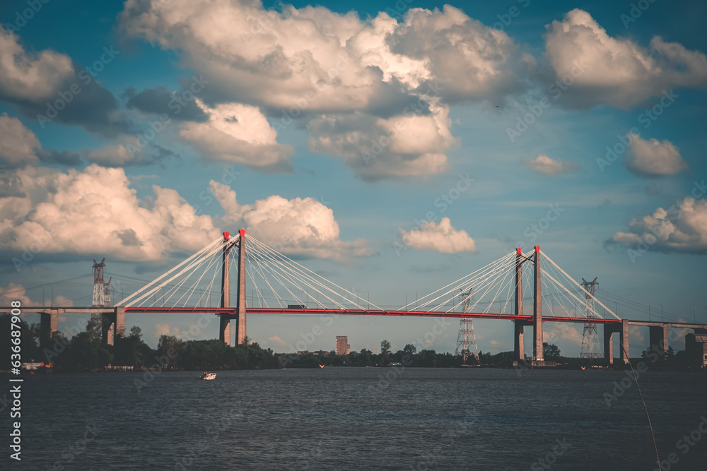 Fototapeta premium bridge at sunset against a cloudy sky