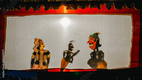 Traditional leather puppet show is also known as Tolu Bommalattam, Bommalattam or Tolpava Koothu, is a traditional shadow puppetry art form is the roots of Tamil Nadu, South India. photo