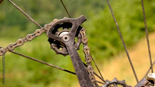 Dirty greasy gear chain linkage turning around in circle