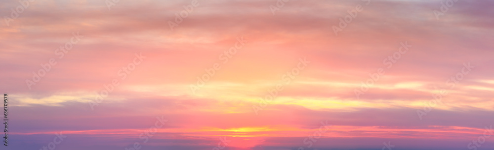 Real amazing panoramic sunrise sundown sunset sky with gentle colorful clouds. real sky and clouds.