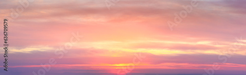 Real amazing panoramic sunrise sundown sunset sky with gentle colorful clouds. real sky and clouds. © Taiga