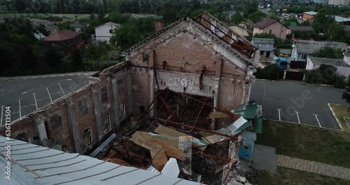 Palace of Culture. Devastated exterior of the House of Culture in Irpin. Aerial. Ukraine. War in Ukraine.  photo