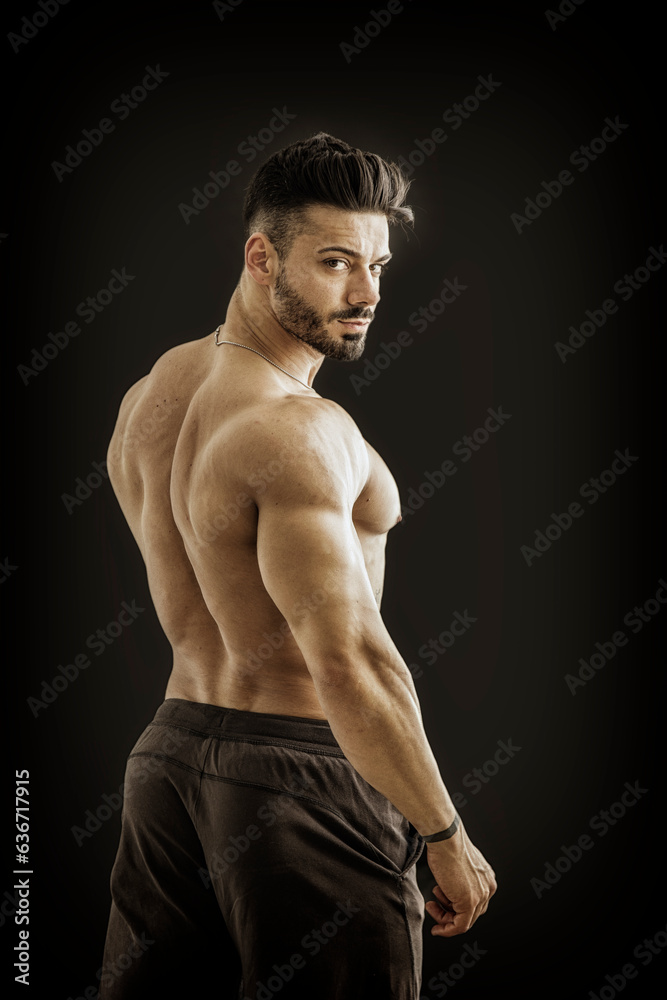 Fototapeta premium Photo of a shirtless man posing for a picture