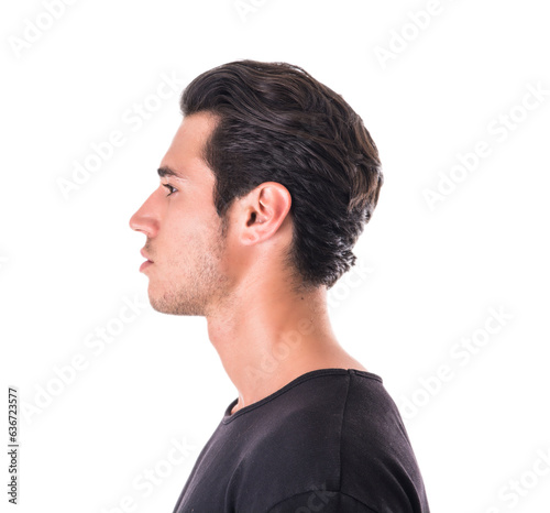 A man in a black shirt with a contemplative gaze