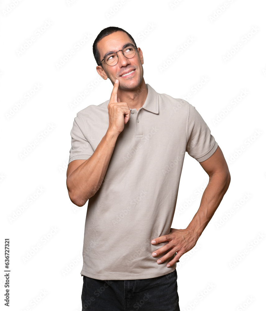 Concerned young man making a gesture of doubt Concerned young man making a gesture of doubt