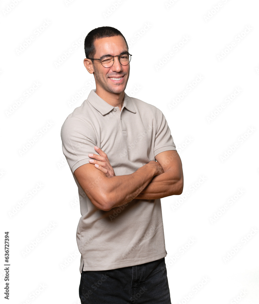 Happy young man using his hands like a binoculars Happy young man using his hands like a binoculars