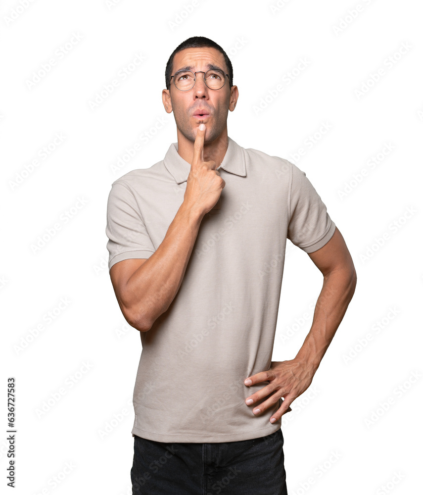 Happy young man looking up gesture Happy young man looking up gesture