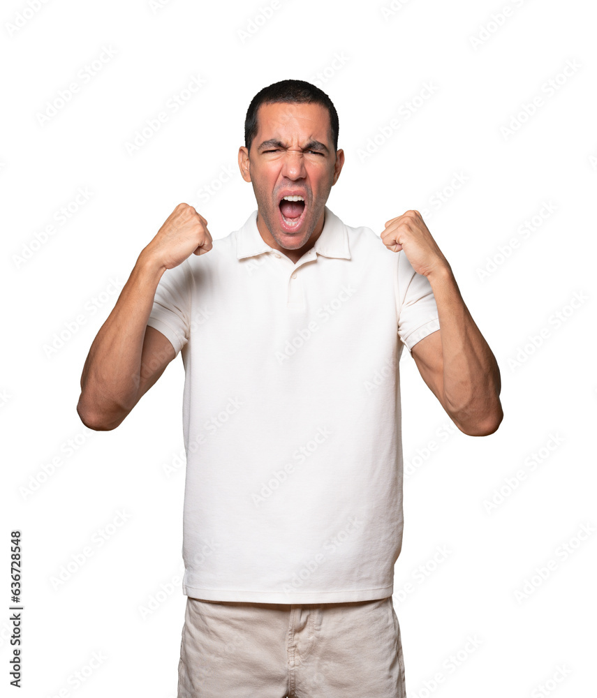 Upset young man doing a competitive gesture Upset young man doing a competitive gesture