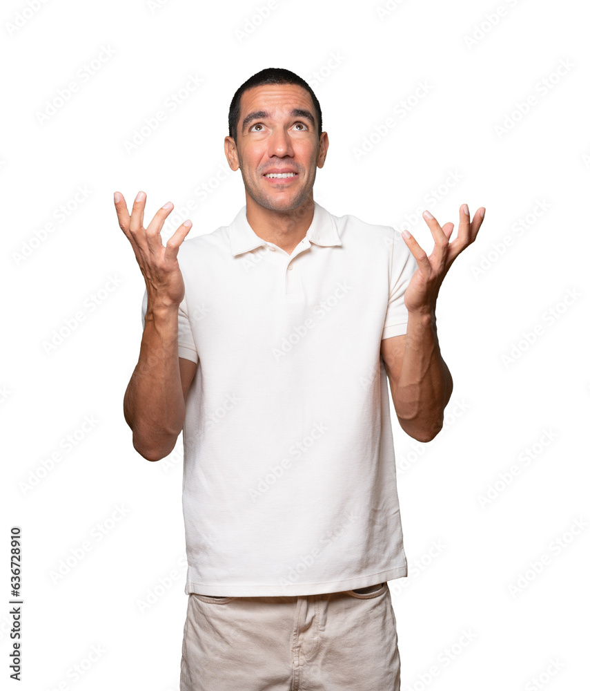 Happy young man looking up gesture Happy young man looking up gesture