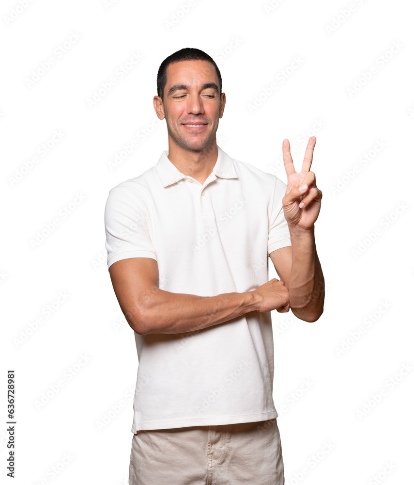 Young man making a number two gesture Young man making a number two gesture