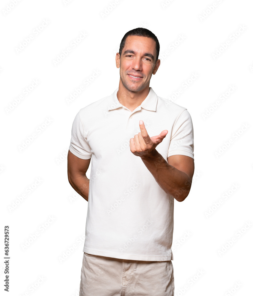 Young man doing a gesture of invitation with his hand Young man doing a gesture of invitation with his hand