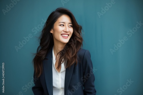 Portrait of a young businesswoman smiling and looking at the camera