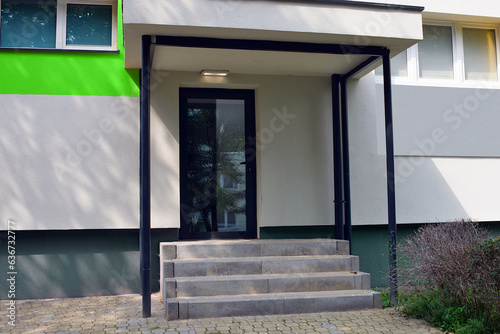 Tableau sur toile Staircase entrance to the building on the elevation stairs and roof with cantile