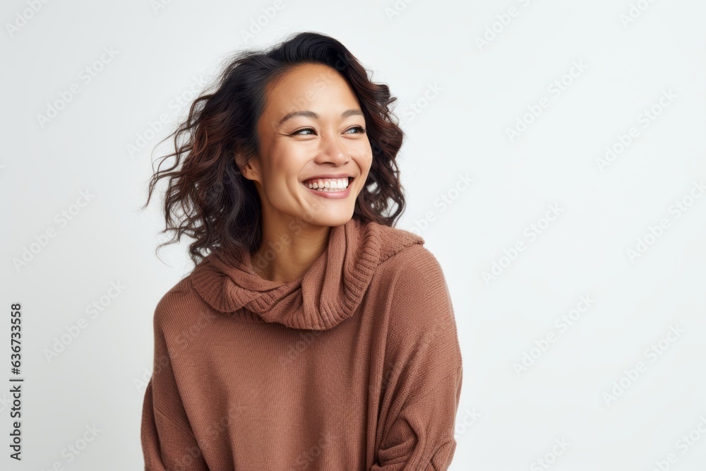 Portrait of a happy woman smiling and looking at camera over white background Portrait of a happy woman smiling and looking at camera over white background