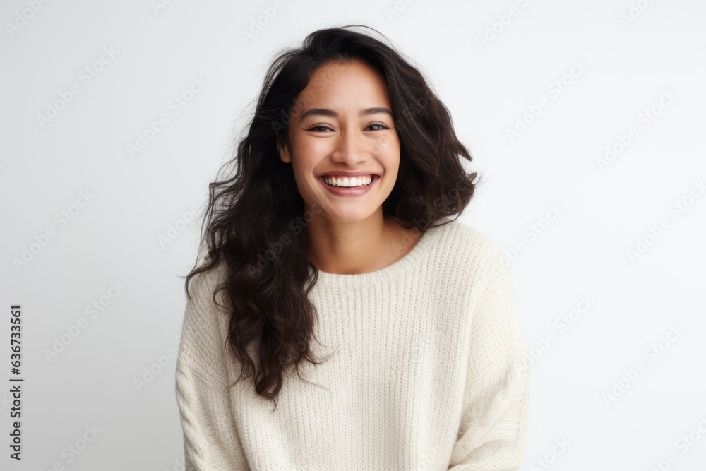 Portrait of a happy young woman smiling at camera over white background Portrait of a happy young woman smiling at camera over white background