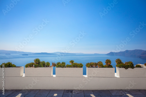 Obraz na płótnie Conceptual background - Santorini. Greece, Santorini island, Oia - white architecture, flowers and blue sea and sky. Abstract background, empty space. Greek Islands, Santorini w salonie