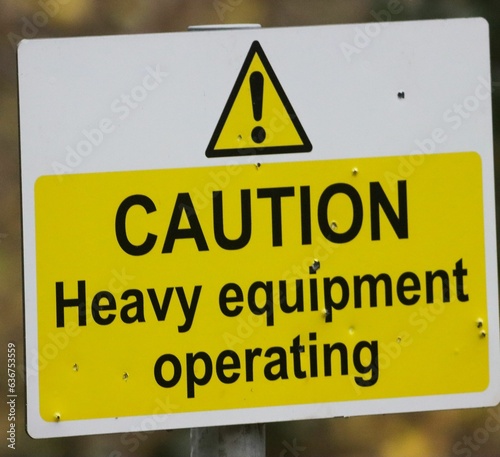Caution heavy equipment operating sign