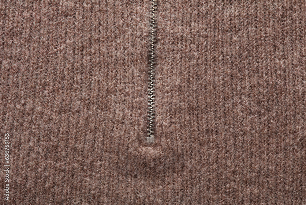 Woolen sweater with metal zip close-up Woolen sweater with metal zip close-up