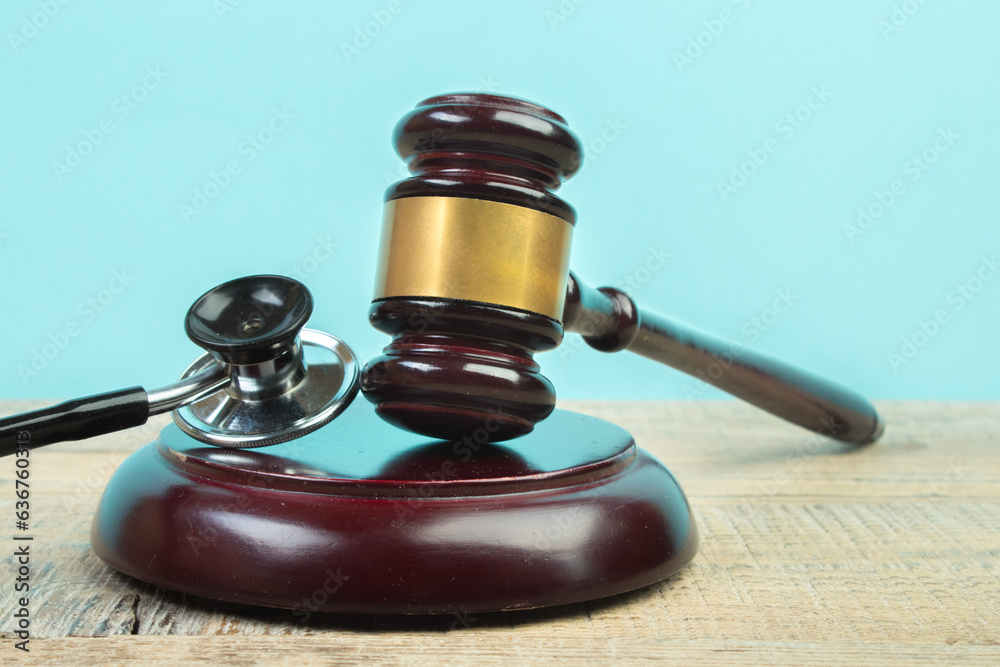 Judge gavel and stethoscope. The law in medicine, the sentence on medical negligence. Judge gavel and stethoscope. The law in medicine, the sentence on medical negligence.