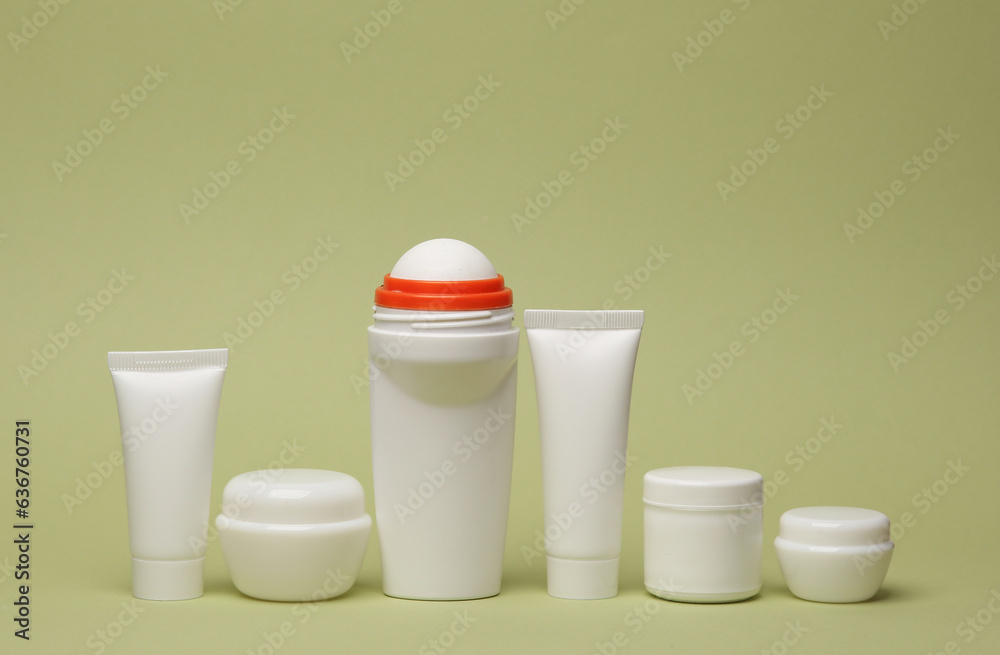 Beauty products on green background. Mockup Beauty products on green background. Mockup