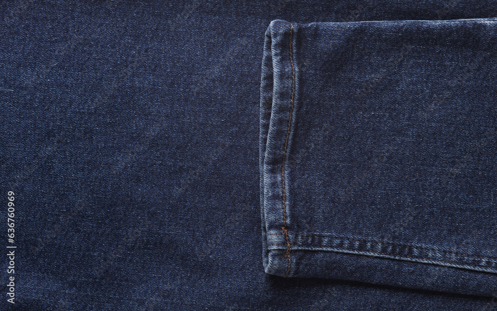 Fototapeta premium Texture of blue jeans closeup