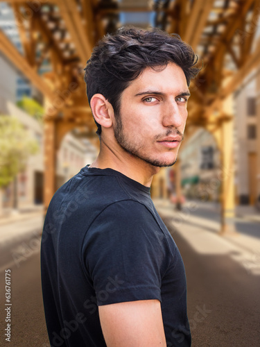 Head and shoulder shot of one handsome young man in urban setting © theartofphoto