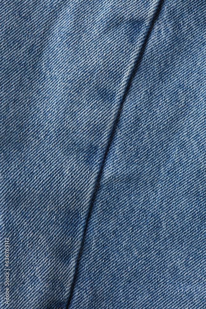 Seam of blue denim close up Seam of blue denim close up